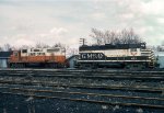 GMO 633 EMD GP35, and IC 9508 EMD GP38AC sit in the yard 